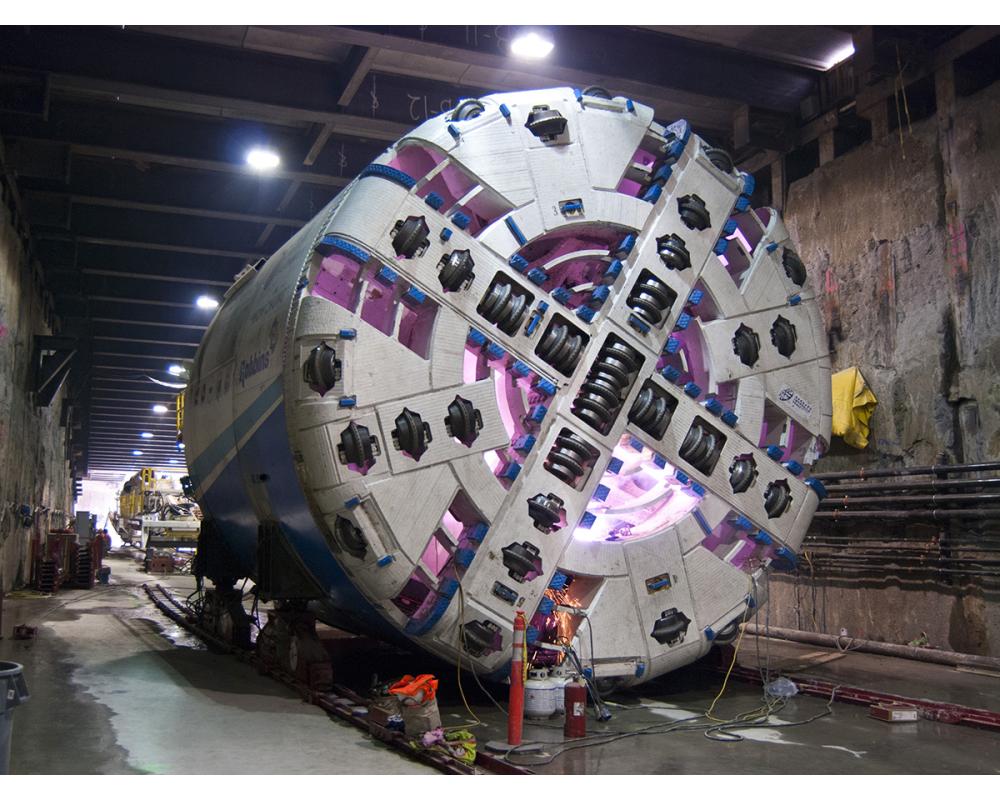 The forward portion of tunnel boring machine Mom Chung is seen being assembled.