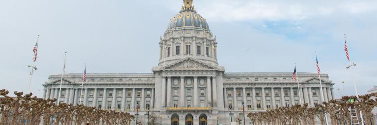 wide angle view of city hall taken from civic center plaza