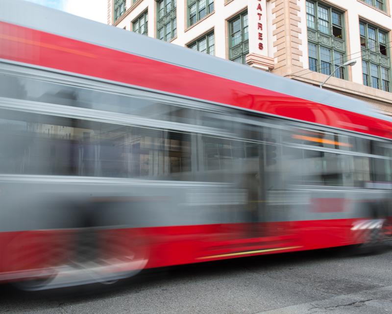 Blurred motion photo of Muni bus on O'Farrell Street