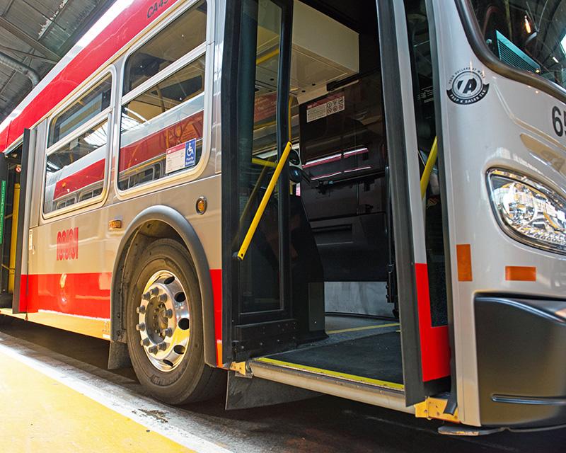 A Muni bus with the door open