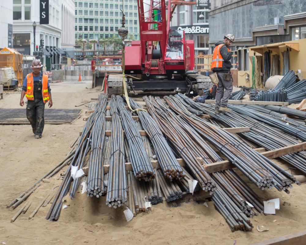 Prepared strands of rebar wait at the surface worksite just north of O'Farrell to be lowered into the UMS station box.