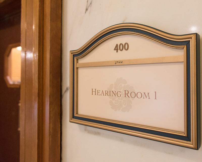 sign for board meeting room 400 in City Hall with door in background