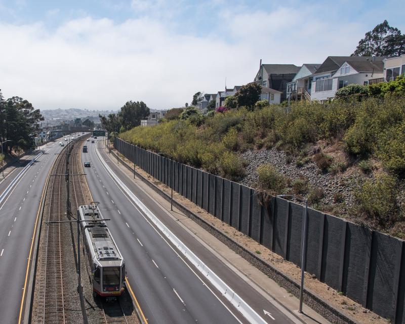 overhead view south on San Jose Ave with roadway, J train and houses