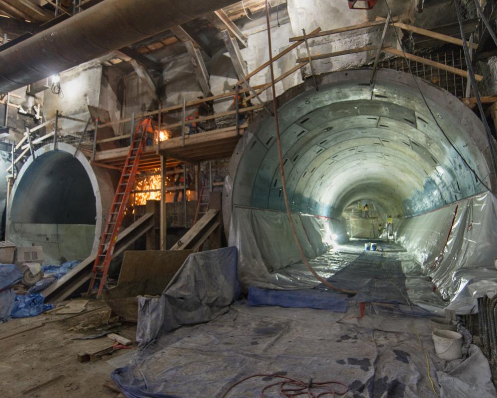 Steel mesh and shotcrete are being installed at the south headwall of the UMS station box, just south of O'Farrell and Stockton.