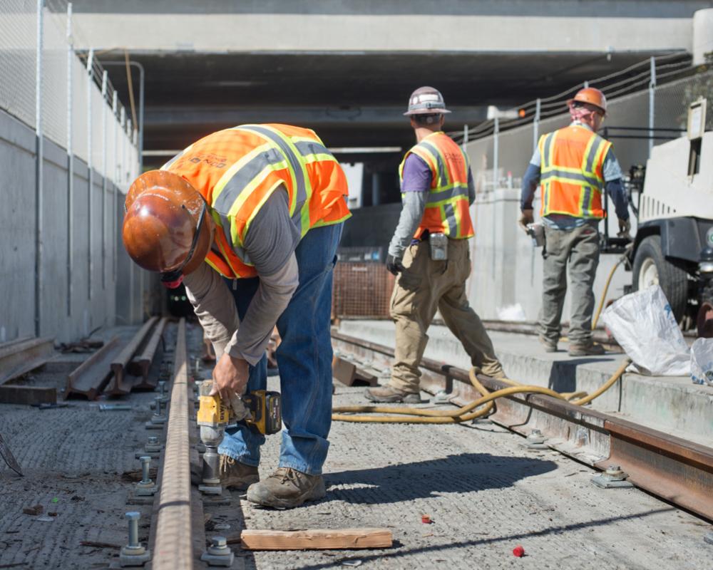 Sections of rail are bolted down on the west side of the tunnel portal, just north of the 4th and Bryant intersection.