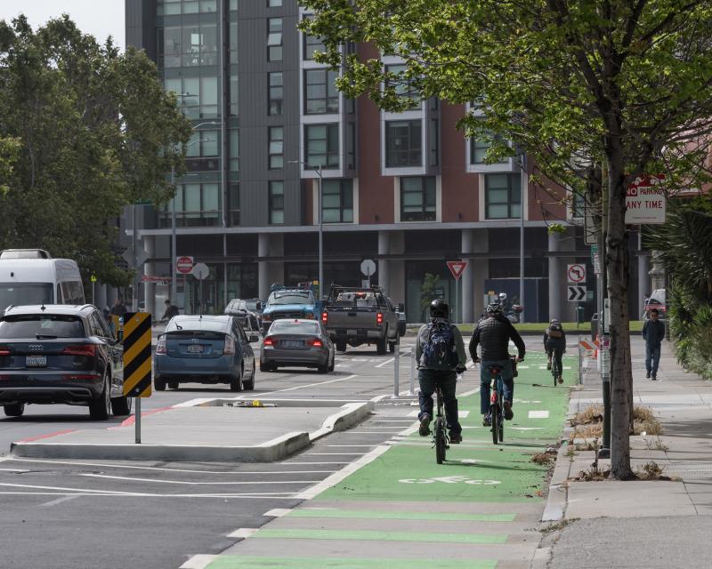 People biking on 8th Street towards Townsend 