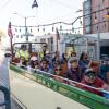 Riders sitting in the boat streetcar.