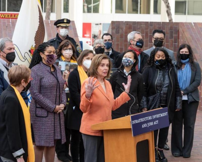 Nancy Pelosi with Mark DeSaulnier (left) speaking at the Infrastructure Bill and Vision Zero Press Conference 