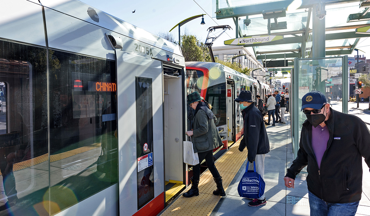 Passengers boarding a train at the new 4th and Brannon platform.