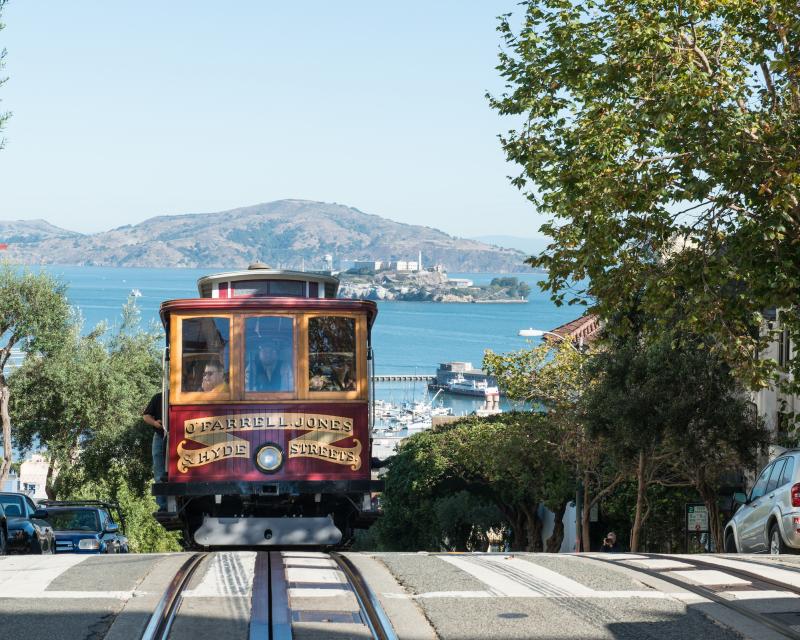 cable car ascending the hill