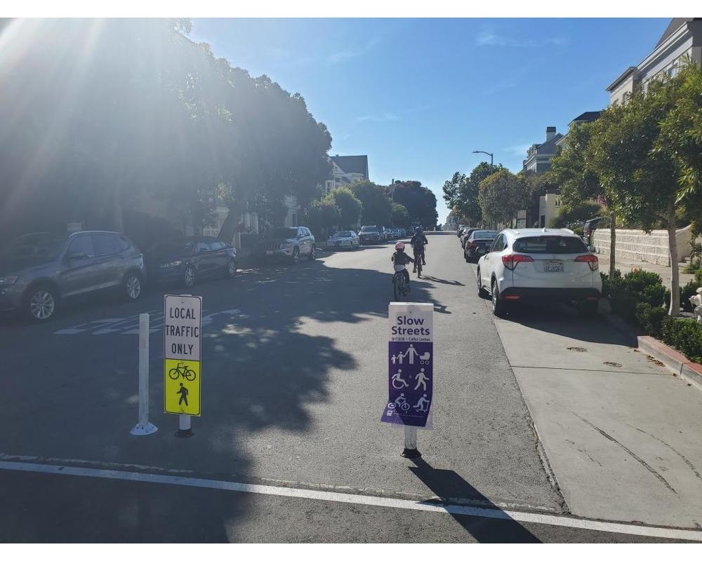 Kids biking on a slow street