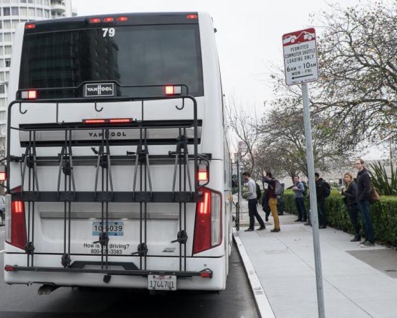 Back of a commuter shuttle in the city