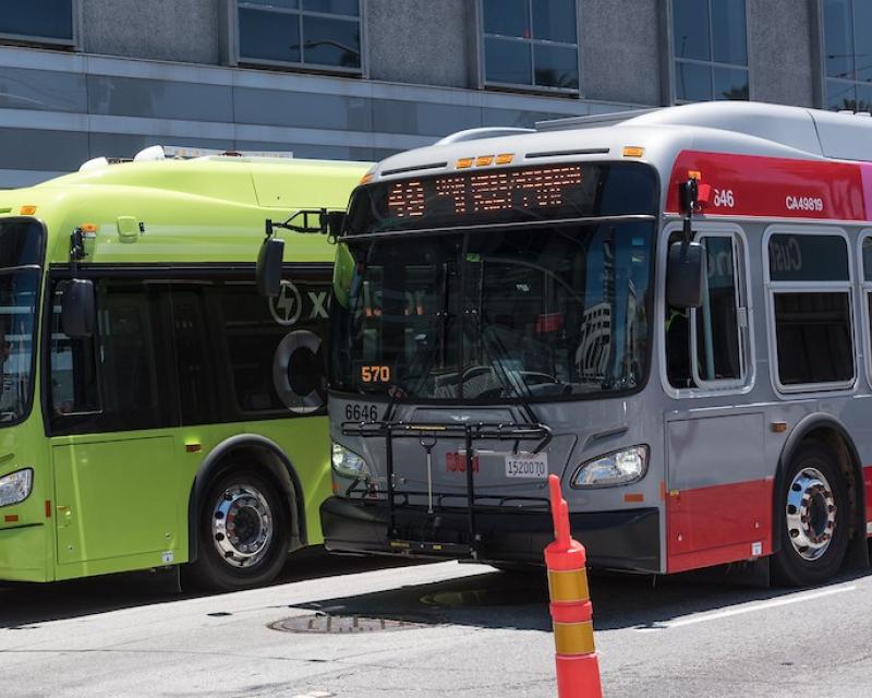 All electric battery bus next to our current Muni coach