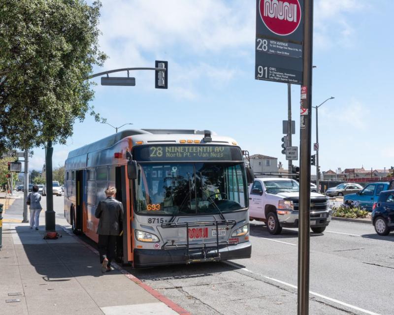 Photo of the 28 19th Avenue bus with a passenger boarding