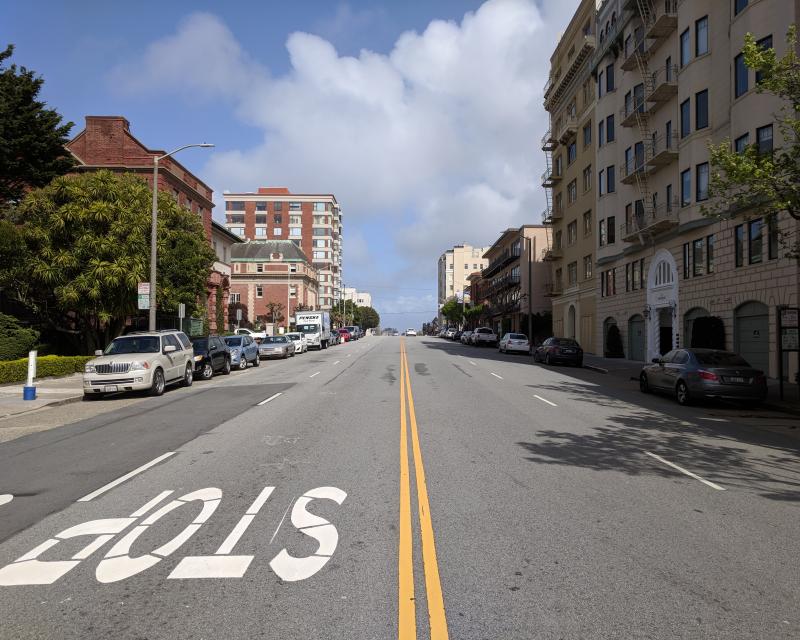 View of Broadway down the middle of the street, looking east from Fillmore Street