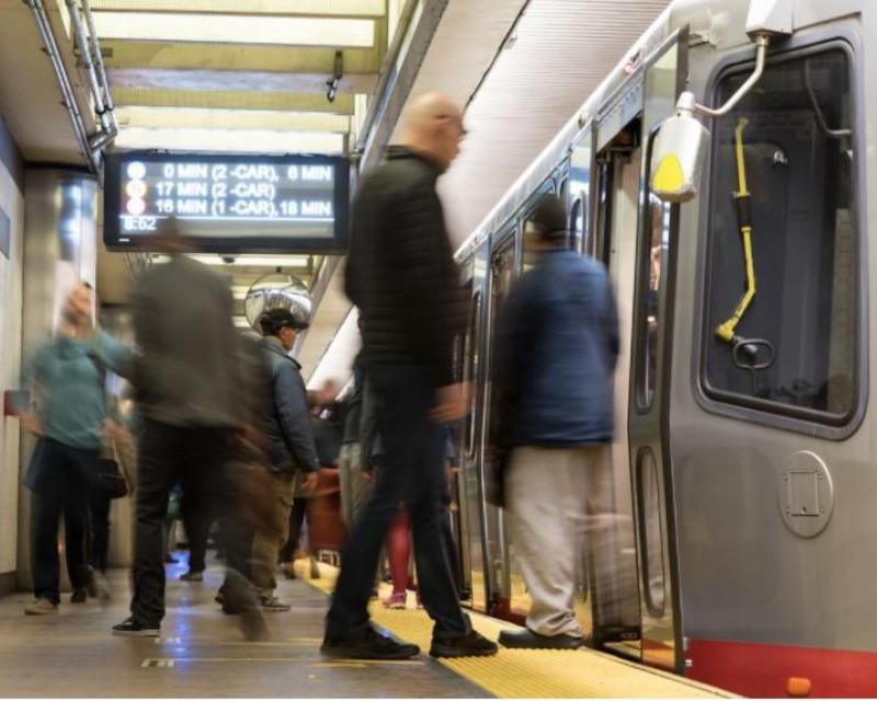 Picture of riders boarding a Muni train