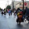 Kids and people biking on Page Slow Street on their way to school