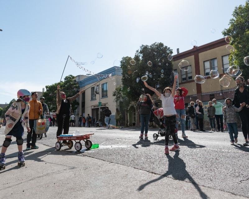 Children playing on a slow street   