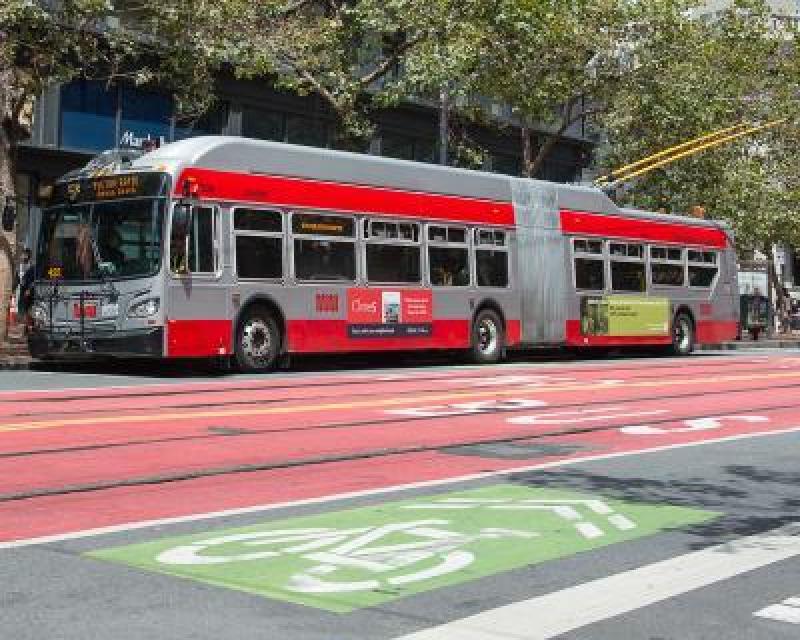 Trolley driving down street