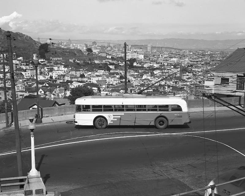 33 ashbury coach with city skyline in background, 1947