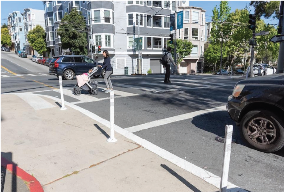 Image of Pedestrian SAfety zone that includes vertical elements and paint.